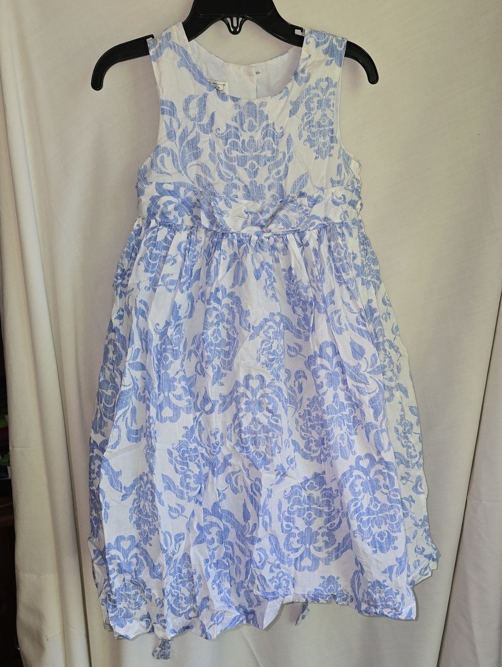 Pippa & Julie White Dress with Light Blue Floral Print and Bow
